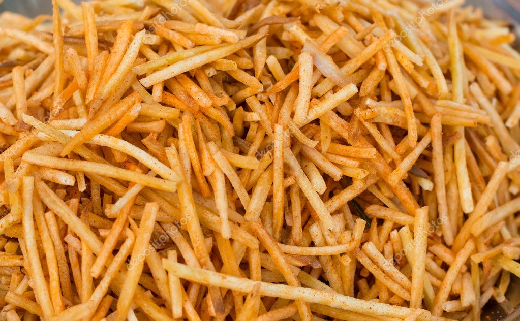 Spicy french fries from India — Stock Photo © a_lisa 24186671