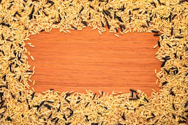 frame mixed rice on a wood texture