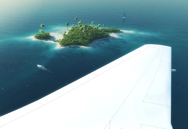 Aile d'un avion volant au-dessus du paradis île tropicale — Photo
