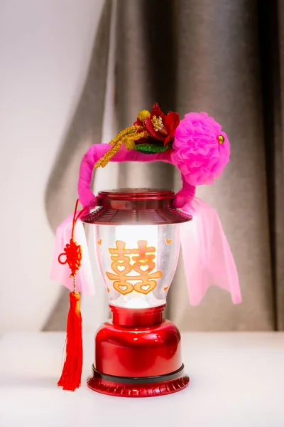 Lamp in the Chinese Wedding. Lantern for Chinese wedding ceremony. A traditional wedding symbol. The Chinese text in the photo is pronounced Shuang xi and translate happiness, happiness is multiplied