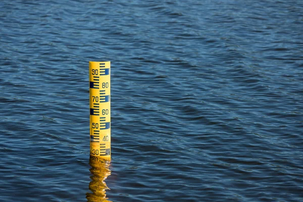 Water level meter located in the water of the dam. Concepts for natural resources.  Water level gauges in the background is the reservoir of water