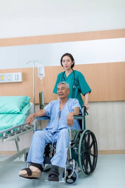 Clinicians in uniform take care sad Patient at hospital.