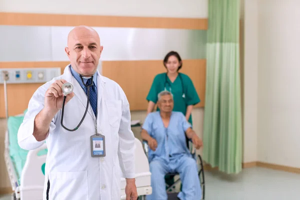 Doctor Holding Stethoscope Hospital Friendly Male Doctor Dressed Uniform Holding — Stock Photo, Image