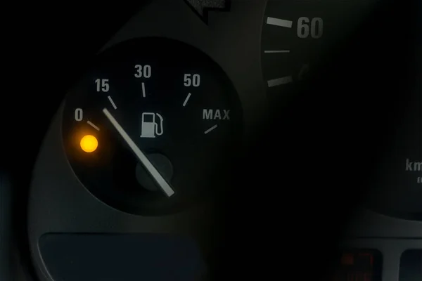 Empty fuel warning light in car dashboard. Fuel pump icon. gasoline gauge dash board in car with digital warning sign of run out of fuel turn on. Low level of fuel show on speedometer dashboard.