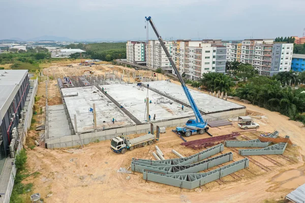 Aerial drone Photo a construction site. Construction site shot Photo from Drone. Aerial Photo Busy Industrial Construction Site