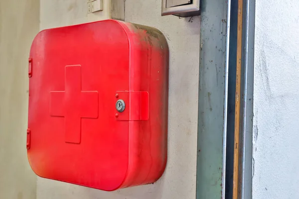 Red First aid box for safety reason at factory.