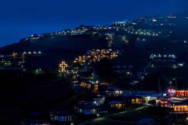 The village in the mountains at night. Small village in high mountains in Thailand.