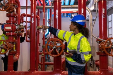 Engineer or technician work checking Fire suppression system and fire equipment