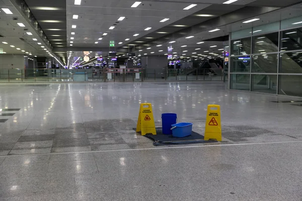 Yellow sign - caution. Sign showing warning of caution wet floor. Wet floor caution sign.