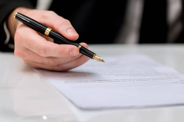 Business Man approve sign on business document. Business approve sign and certificate concept. Businessman Hands Signing a document