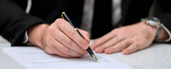 Business Man approve sign on business document. Business approve sign and certificate concept. Businessman Hands Signing a document
