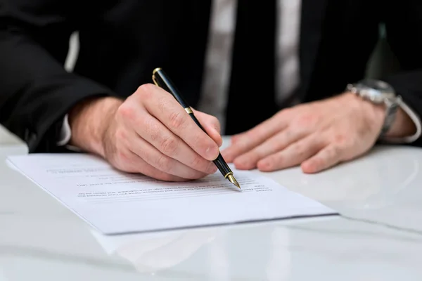 Business Man approve sign on business document. Business approve sign and certificate concept. Businessman Hands Signing a document