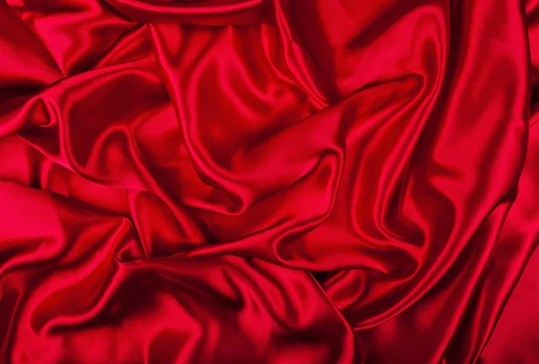 Röd satin bakgrund Royaltyfria Stockfoton
