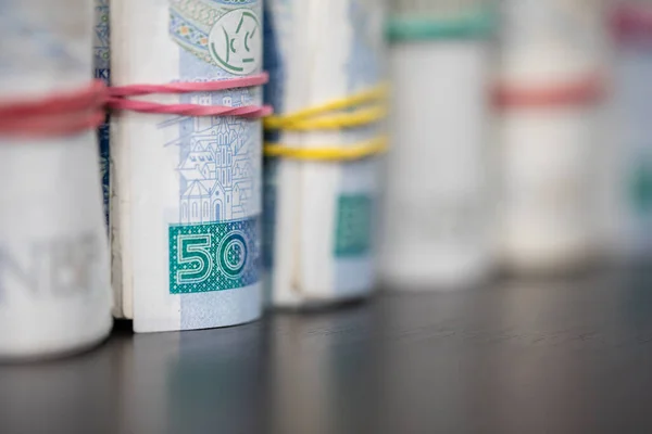 You can see a rolled up fifty dollar bill in the foreground. — Foto de Stock