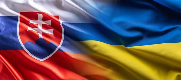 Waving Flag Concept Ukraine Slovakia Symbolising Political Connection — Stock Photo, Image