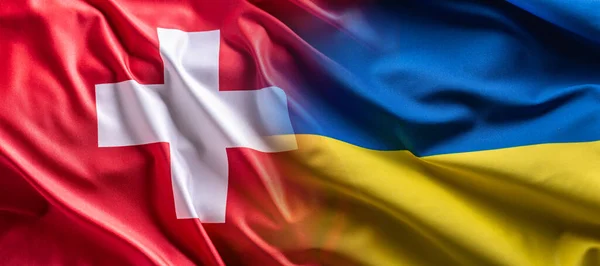 Koncept Vlnění Vlajky Ukrajiny Švýcarska Symbolizující Politické Spojení — Stock fotografie