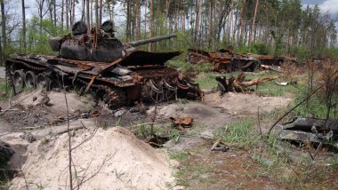 Burned tanks of the Russian invaders in the Kyiv region. Selective focus. 
