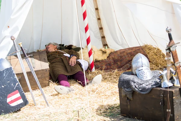 Man with medieval costume sleep in tend — Stock Photo, Image