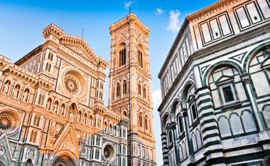 Famous Cathedral Santa Maria Del Fiore with Giotto's Campanile and Baptistery of St. John at sunset on Piazza del Duomo in Florence, Tuscany, Italy clipart