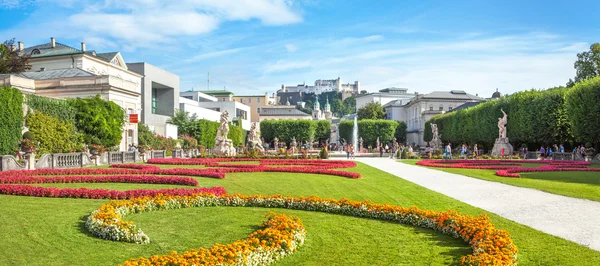 Panoramic view of famous Mirabell Gardens with the old historic — Stock Photo, Image