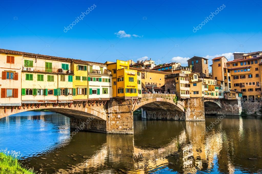Famous Ponte Vecchio with river Arno at sunset in Florence Italy Famous Ponte Vecchio with river Arno at sunset in Florence Italy