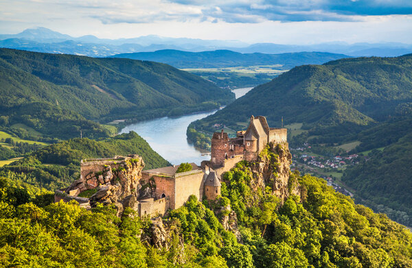 Beautiful landscape with Aggstein castle ruin and Danube river at sunset in Wachau, Austria
