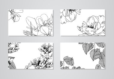 Business cards with black and white flowers clipart