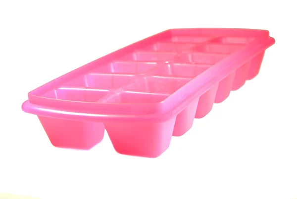 Molde de plástico rosa para gelo congelado — Fotografia de Stock