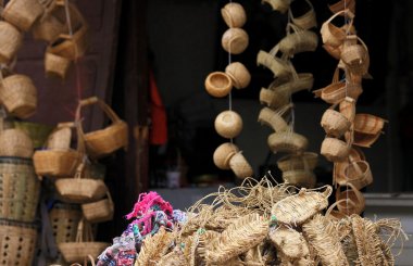 Basketwork items and chinese straw, hemp shoes.