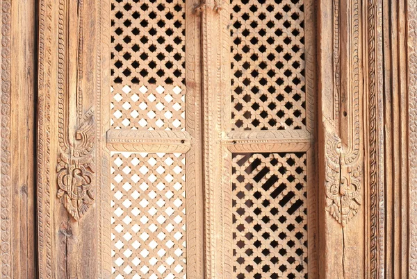 Patan-old wooden lattice window-Mul Chowk. — Stock Photo, Image