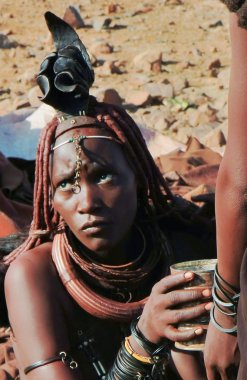 Portrait of a Himba woman in Epupa, Kunene, Kaokoland, Namibia. clipart