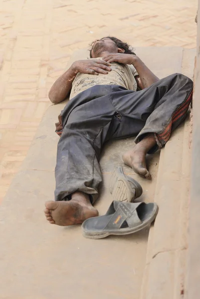 Sleeping guy in Durbar Square-Bhaktapur-Nepal. 0268