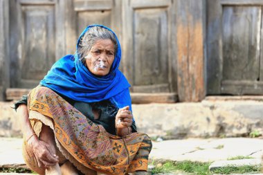 Smoking old woman. Bandipur-Nepal. 0380 clipart