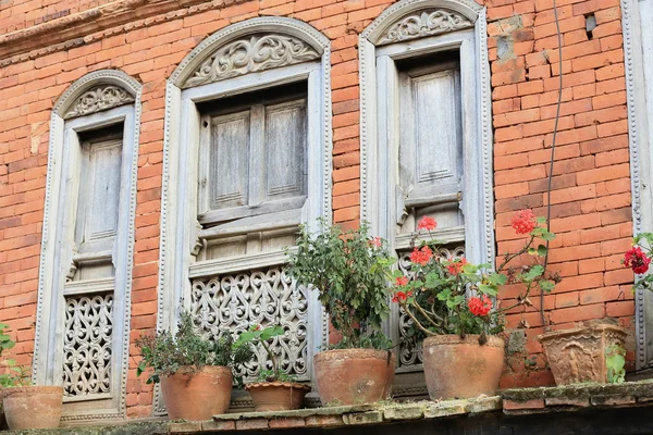 Red brick facade newari house in Bandipur-Nepal. 0374 — Stock Photo, Image