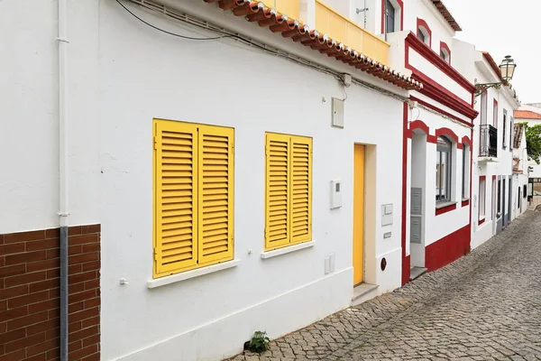 Row Restored Whitewashed Two Story Townhouses Yellow Red Gray Painted — Foto Stock