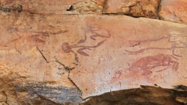 Ancestral Aboriginal rock art: Mimi spirits paintings-red ochre and animal blood-Mountford or Northern Running Figures group dated by archaeologists c.5000 years old. Ubirr site-Kakadu-NT-Australia.