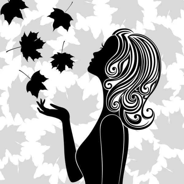 Silhouet van een jonge vrouw met vliegende bladeren Rechtenvrije Stockvectors