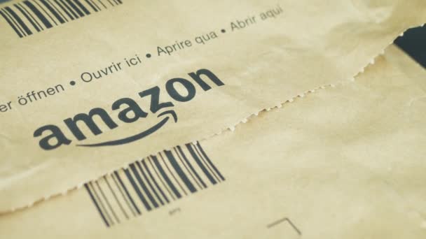 ROME, ITALY - MAY 21, 2021. Italy, Roma.Amazon parcel rotates on the table, the largest first-person e-commerce of the time — Stock Video
