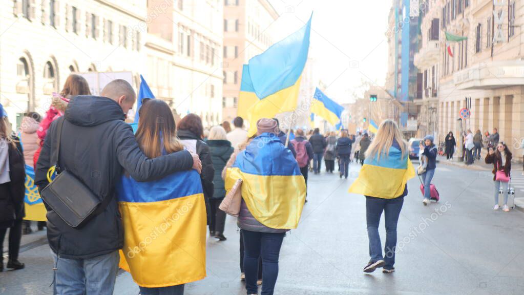 Italy, Rome, March 13, 2022. Photo with selective focus. Anti-war protest or rally against the invasion of Ukraine People are protesting against Russia attack on Ukraine.