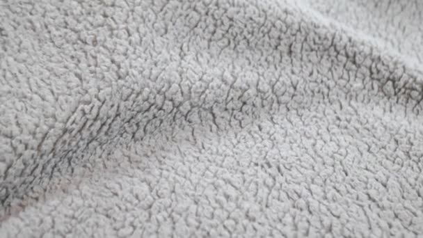 Kleidung Material grauer Stoff Textur. Wolle, Wolle, Wollfasern. Warme Winterkleidung. — Stockvideo