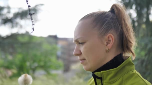 Beautiful Girl Blows Dandelion Flower Make Wish She Laughs — Vídeo de stock