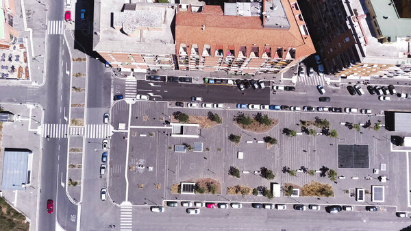 Top view with parking and road, when the vehicle passes by - moves forward.