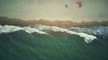 4K Aerial Front View. Beach, sea, sand and palms. Drone view of a beautiful white tropical sand beach on a summer day. Top view empty and clean beach