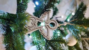 Christmas decorations on the Christmas tree, twinkling Christmas lights, angel, vertical video