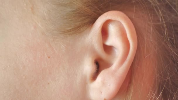 Female Ear Earring Close Ear Woman Blonde Decorative Piercing — Stock Video