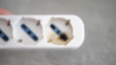 burnt-out electrical extension cord, Electricity concept