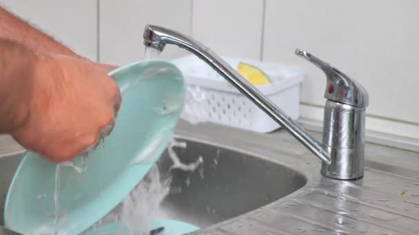 Young Man Washes Dishes Home Soap Sponge Guy Washes Dishes — Stock Video