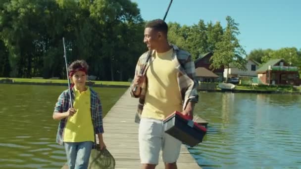 Handsome African Father Lovely Preadolescent Multiracial Son Fishing Rods Tackle — Vídeos de Stock