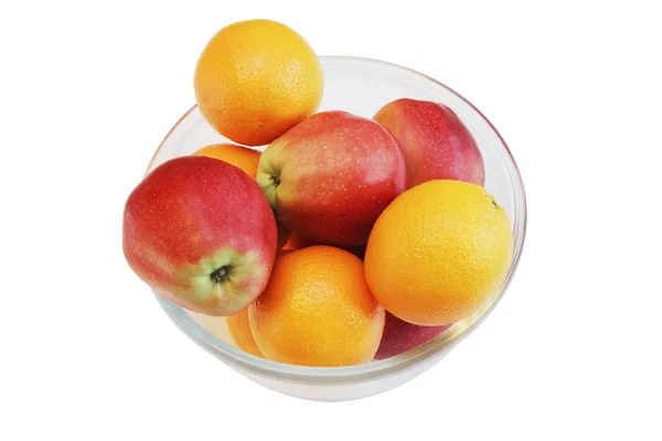 Apples and oranges on glass plate, isolated. — Stock Photo, Image