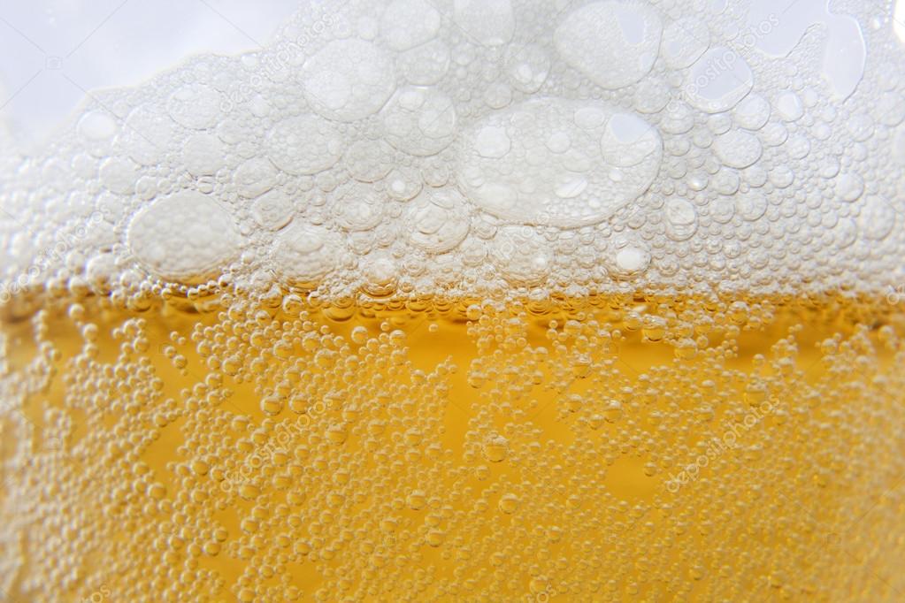 Beer macro foam and bubbles background